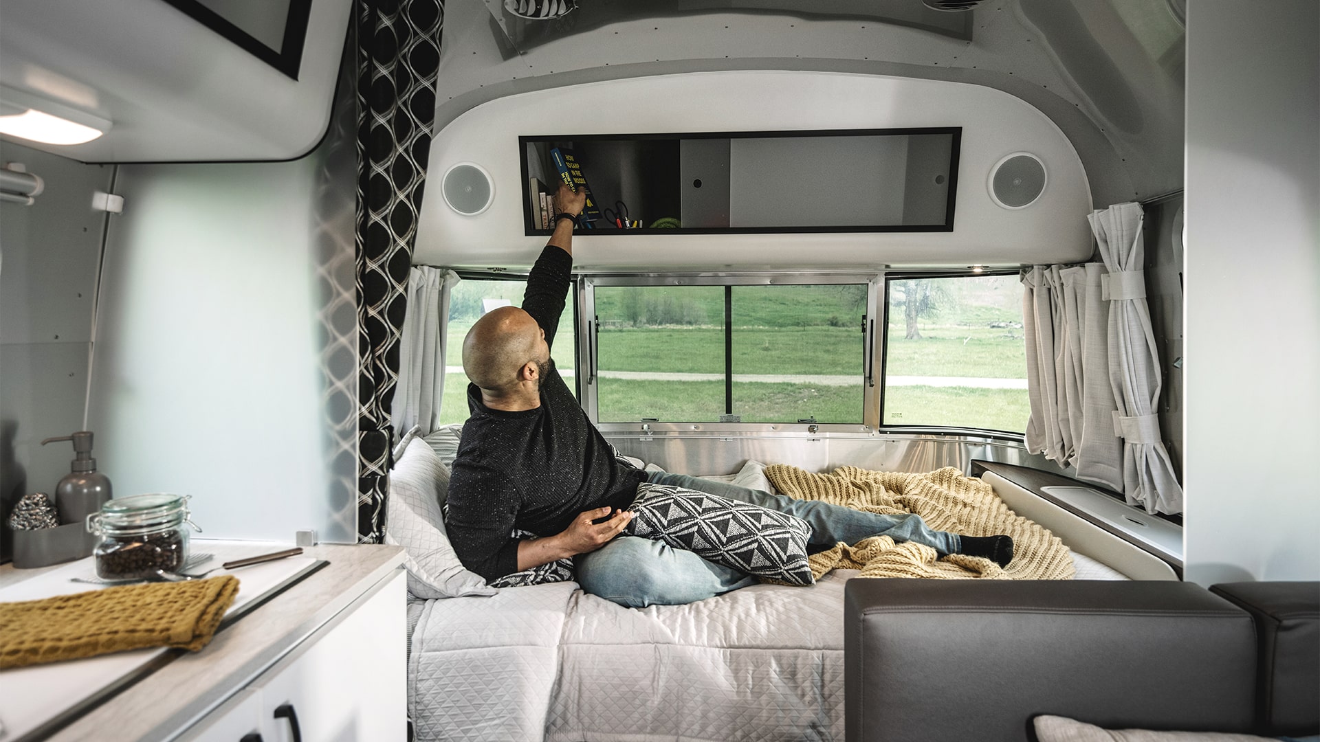 Airstream-Caravel-Travel-Trailer-Front-Bed-to-Storage-min