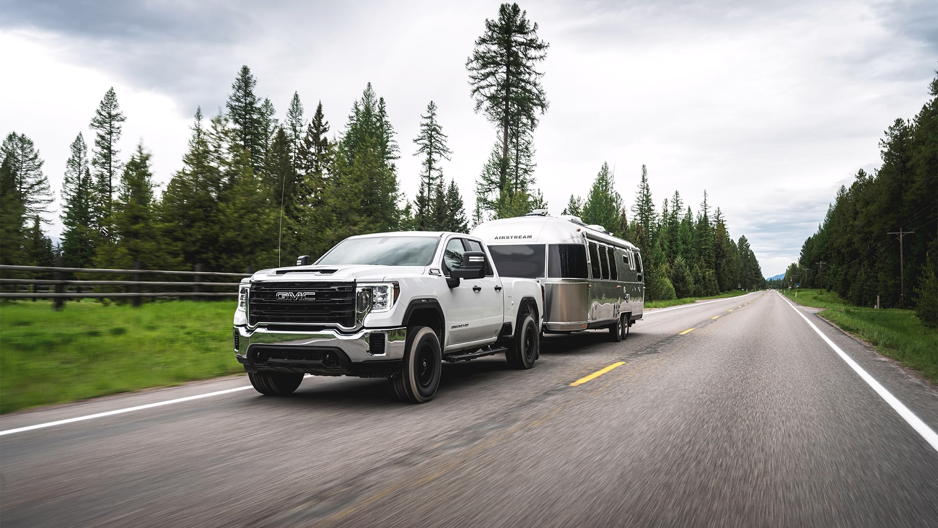 Airstream-Globetrotter-Travel-Trailer-Exterior-Driving-min